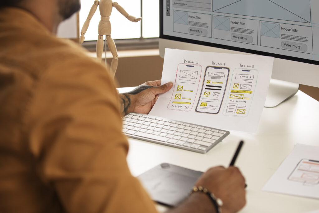 man working with computer side view
