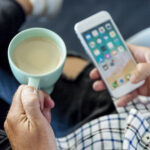 modern composition with coffee cup smartphone